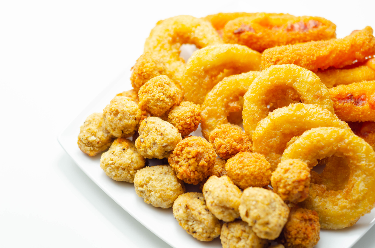 image of fried chicken bites, onion rings, and mozzarella sticks